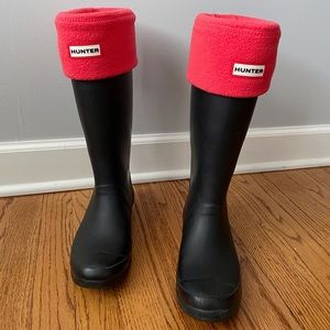 black hunter boots with red insertable sock